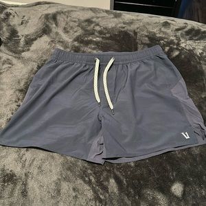 Men’s navy blue small Vuori 5” running shorts